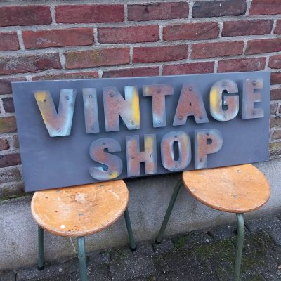 Metalen reclamebord "VINTAGE SHOP".
